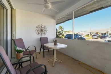 Delightful one level townhouse with step saving kitchen and 2 on Cypress Lakes Golf Course - West Palm Beach in Florida - for sale on GolfHomes.com, golf home, golf lot