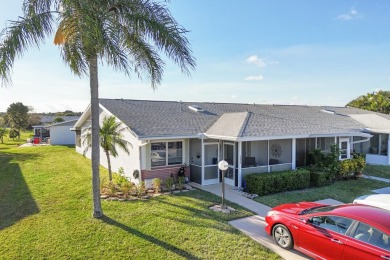 Delightful one level townhouse with step saving kitchen and 2 on Cypress Lakes Golf Course - West Palm Beach in Florida - for sale on GolfHomes.com, golf home, golf lot
