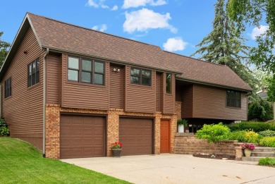 Welcome to your dream home just a block away from the serene on Monroe Country Club in Wisconsin - for sale on GolfHomes.com, golf home, golf lot