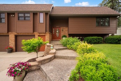 Welcome to your dream home just a block away from the serene on Monroe Country Club in Wisconsin - for sale on GolfHomes.com, golf home, golf lot