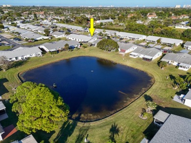 Delightful one level townhouse with step saving kitchen and 2 on Cypress Lakes Golf Course - West Palm Beach in Florida - for sale on GolfHomes.com, golf home, golf lot