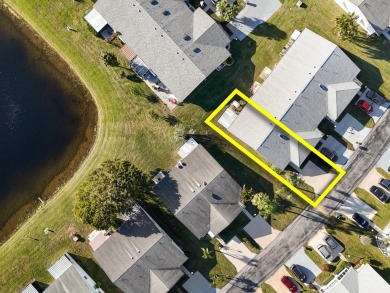 Delightful one level townhouse with step saving kitchen and 2 on Cypress Lakes Golf Course - West Palm Beach in Florida - for sale on GolfHomes.com, golf home, golf lot