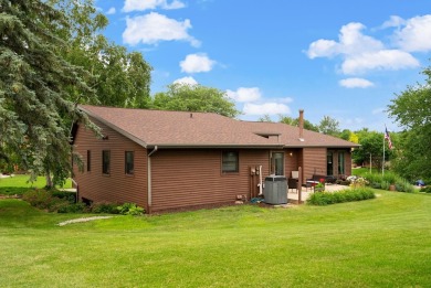 Welcome to your dream home just a block away from the serene on Monroe Country Club in Wisconsin - for sale on GolfHomes.com, golf home, golf lot