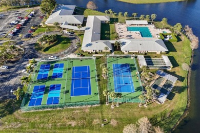 Delightful one level townhouse with step saving kitchen and 2 on Cypress Lakes Golf Course - West Palm Beach in Florida - for sale on GolfHomes.com, golf home, golf lot