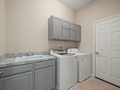 Located in Glen Lakes, this  2006 Lindhorst Custom Classique is on Glen Lakes Country Club in Florida - for sale on GolfHomes.com, golf home, golf lot