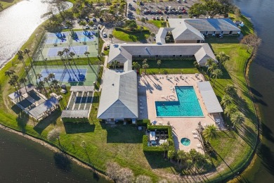 Delightful one level townhouse with step saving kitchen and 2 on Cypress Lakes Golf Course - West Palm Beach in Florida - for sale on GolfHomes.com, golf home, golf lot