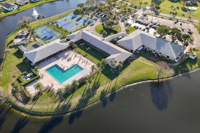 Delightful one level townhouse with step saving kitchen and 2 on Cypress Lakes Golf Course - West Palm Beach in Florida - for sale on GolfHomes.com, golf home, golf lot