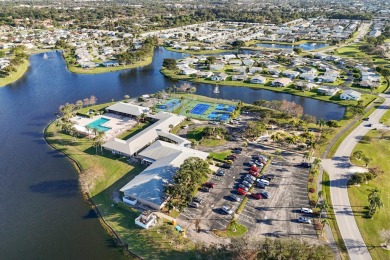 Delightful one level townhouse with step saving kitchen and 2 on Cypress Lakes Golf Course - West Palm Beach in Florida - for sale on GolfHomes.com, golf home, golf lot