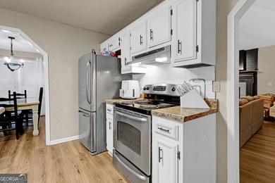 Welcome to this beautifully maintained four-bedroom, two-bath on Golf Club of Macon in Georgia - for sale on GolfHomes.com, golf home, golf lot