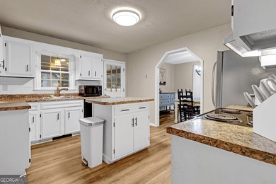 Welcome to this beautifully maintained four-bedroom, two-bath on Golf Club of Macon in Georgia - for sale on GolfHomes.com, golf home, golf lot