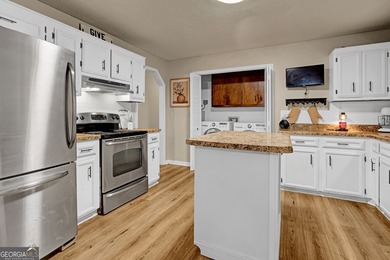 Welcome to this beautifully maintained four-bedroom, two-bath on Golf Club of Macon in Georgia - for sale on GolfHomes.com, golf home, golf lot