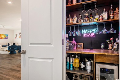 Welcome to this stunning 5-bedroom, 3.5-bath home in the Island on Island Green Golf Club in South Carolina - for sale on GolfHomes.com, golf home, golf lot