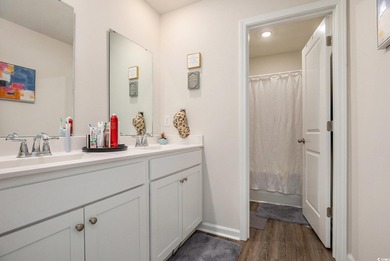 Welcome to this stunning 5-bedroom, 3.5-bath home in the Island on Island Green Golf Club in South Carolina - for sale on GolfHomes.com, golf home, golf lot