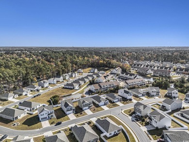 Welcome to this stunning 5-bedroom, 3.5-bath home in the Island on Island Green Golf Club in South Carolina - for sale on GolfHomes.com, golf home, golf lot