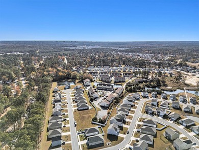 Welcome to this stunning 5-bedroom, 3.5-bath home in the Island on Island Green Golf Club in South Carolina - for sale on GolfHomes.com, golf home, golf lot