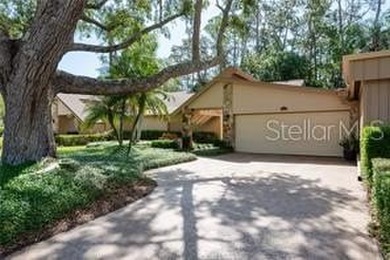 Welcome to your DREAM VILLA nestled in the sought after on Tarpon Woods Golf Club in Florida - for sale on GolfHomes.com, golf home, golf lot