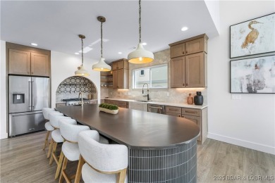 This stunning 5,500 sq ft home offers an exceptional blend of on The Club At Porto Cima in Missouri - for sale on GolfHomes.com, golf home, golf lot