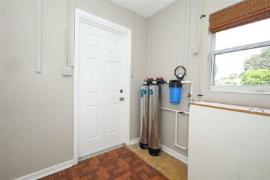 Welcome to 904 Hall Street, a quaint single-family home situated on Crane Creek Reserve Golf Club in Florida - for sale on GolfHomes.com, golf home, golf lot