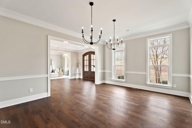 From holiday dinners to movie nights, this home was made for on Hasentree Club in North Carolina - for sale on GolfHomes.com, golf home, golf lot