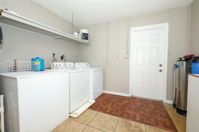 Welcome to 904 Hall Street, a quaint single-family home situated on Crane Creek Reserve Golf Club in Florida - for sale on GolfHomes.com, golf home, golf lot