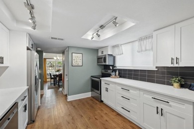STYLISH, MOVE-IN READY TOWNHOME IN SOUGHT-AFTER FARMERS BRANCH on Brookhaven Country Club - Golf Course in Texas - for sale on GolfHomes.com, golf home, golf lot