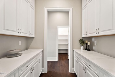 From holiday dinners to movie nights, this home was made for on Hasentree Club in North Carolina - for sale on GolfHomes.com, golf home, golf lot