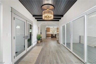 This stunning 5,500 sq ft home offers an exceptional blend of on The Club At Porto Cima in Missouri - for sale on GolfHomes.com, golf home, golf lot