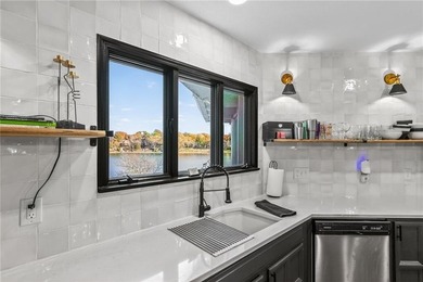 Experience the WOW factor of this beautiful lakefront property on Lakewood Oaks Golf Club, Ltd. in Missouri - for sale on GolfHomes.com, golf home, golf lot