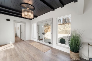 This stunning 5,500 sq ft home offers an exceptional blend of on The Club At Porto Cima in Missouri - for sale on GolfHomes.com, golf home, golf lot