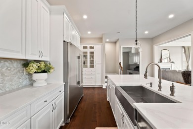 From holiday dinners to movie nights, this home was made for on Hasentree Club in North Carolina - for sale on GolfHomes.com, golf home, golf lot