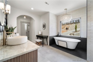 This stunning 5,500 sq ft home offers an exceptional blend of on The Club At Porto Cima in Missouri - for sale on GolfHomes.com, golf home, golf lot