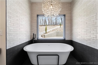 This stunning 5,500 sq ft home offers an exceptional blend of on The Club At Porto Cima in Missouri - for sale on GolfHomes.com, golf home, golf lot