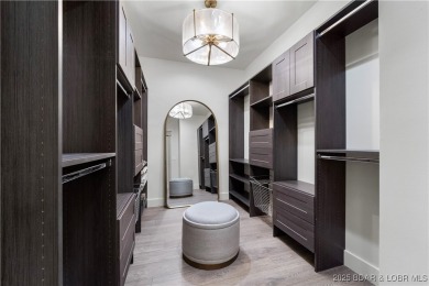 This stunning 5,500 sq ft home offers an exceptional blend of on The Club At Porto Cima in Missouri - for sale on GolfHomes.com, golf home, golf lot