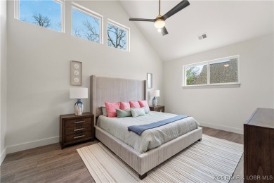 This stunning 5,500 sq ft home offers an exceptional blend of on The Club At Porto Cima in Missouri - for sale on GolfHomes.com, golf home, golf lot
