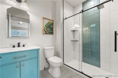 This stunning 5,500 sq ft home offers an exceptional blend of on The Club At Porto Cima in Missouri - for sale on GolfHomes.com, golf home, golf lot