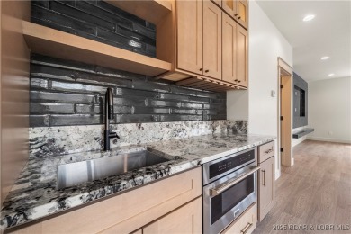 This stunning 5,500 sq ft home offers an exceptional blend of on The Club At Porto Cima in Missouri - for sale on GolfHomes.com, golf home, golf lot