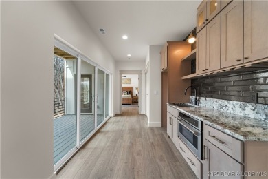 This stunning 5,500 sq ft home offers an exceptional blend of on The Club At Porto Cima in Missouri - for sale on GolfHomes.com, golf home, golf lot
