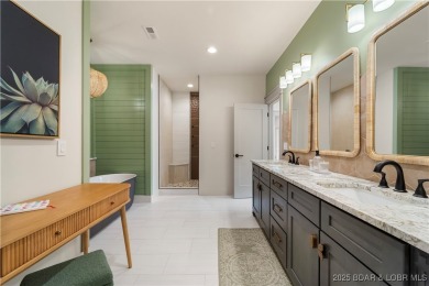 This stunning 5,500 sq ft home offers an exceptional blend of on The Club At Porto Cima in Missouri - for sale on GolfHomes.com, golf home, golf lot