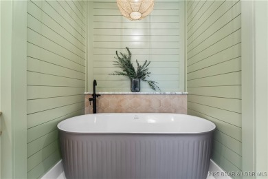 This stunning 5,500 sq ft home offers an exceptional blend of on The Club At Porto Cima in Missouri - for sale on GolfHomes.com, golf home, golf lot