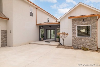 This stunning 5,500 sq ft home offers an exceptional blend of on The Club At Porto Cima in Missouri - for sale on GolfHomes.com, golf home, golf lot