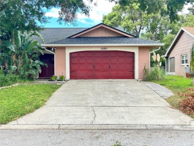 This 3-bedroom, 2-bathroom, 2-car garage, pool property is on Beacon Woods Golf Club in Florida - for sale on GolfHomes.com, golf home, golf lot