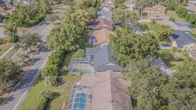 This 3-bedroom, 2-bathroom, 2-car garage, pool property is on Beacon Woods Golf Club in Florida - for sale on GolfHomes.com, golf home, golf lot