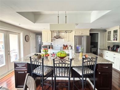 This 3-bedroom, 2-bathroom, 2-car garage, pool property is on Beacon Woods Golf Club in Florida - for sale on GolfHomes.com, golf home, golf lot