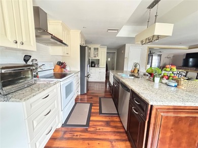 This 3-bedroom, 2-bathroom, 2-car garage, pool property is on Beacon Woods Golf Club in Florida - for sale on GolfHomes.com, golf home, golf lot