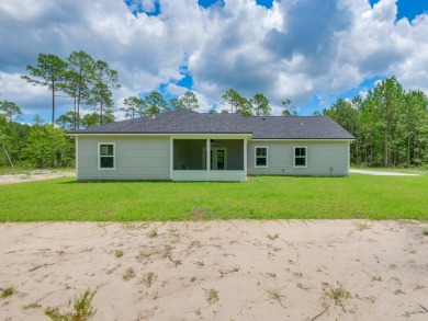 Exquisite new construction on hole 5 of the new, state of the on Wildwood Country Club in Florida - for sale on GolfHomes.com, golf home, golf lot