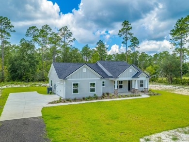 Exquisite new construction on hole 5 of the new, state of the on Wildwood Country Club in Florida - for sale on GolfHomes.com, golf home, golf lot