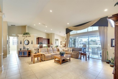 The *Savannah* by Rosecorp Homes-- beautiful *Great Room* floor on River Wilderness Golf and Country Club in Florida - for sale on GolfHomes.com, golf home, golf lot