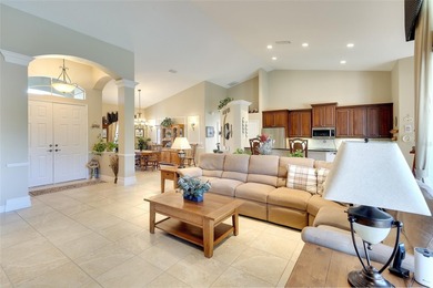 The *Savannah* by Rosecorp Homes-- beautiful *Great Room* floor on River Wilderness Golf and Country Club in Florida - for sale on GolfHomes.com, golf home, golf lot