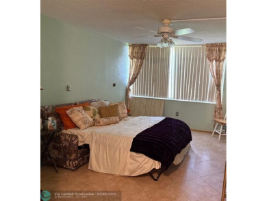 REDUCED for a quick sale!!!!Banyan building. First floor! on Pembroke Lakes Golf Club in Florida - for sale on GolfHomes.com, golf home, golf lot