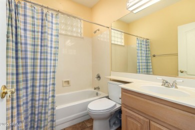 This beautiful four-bedroom, three-bathroom home is located in a on The Legend at Arrowhead in Arizona - for sale on GolfHomes.com, golf home, golf lot